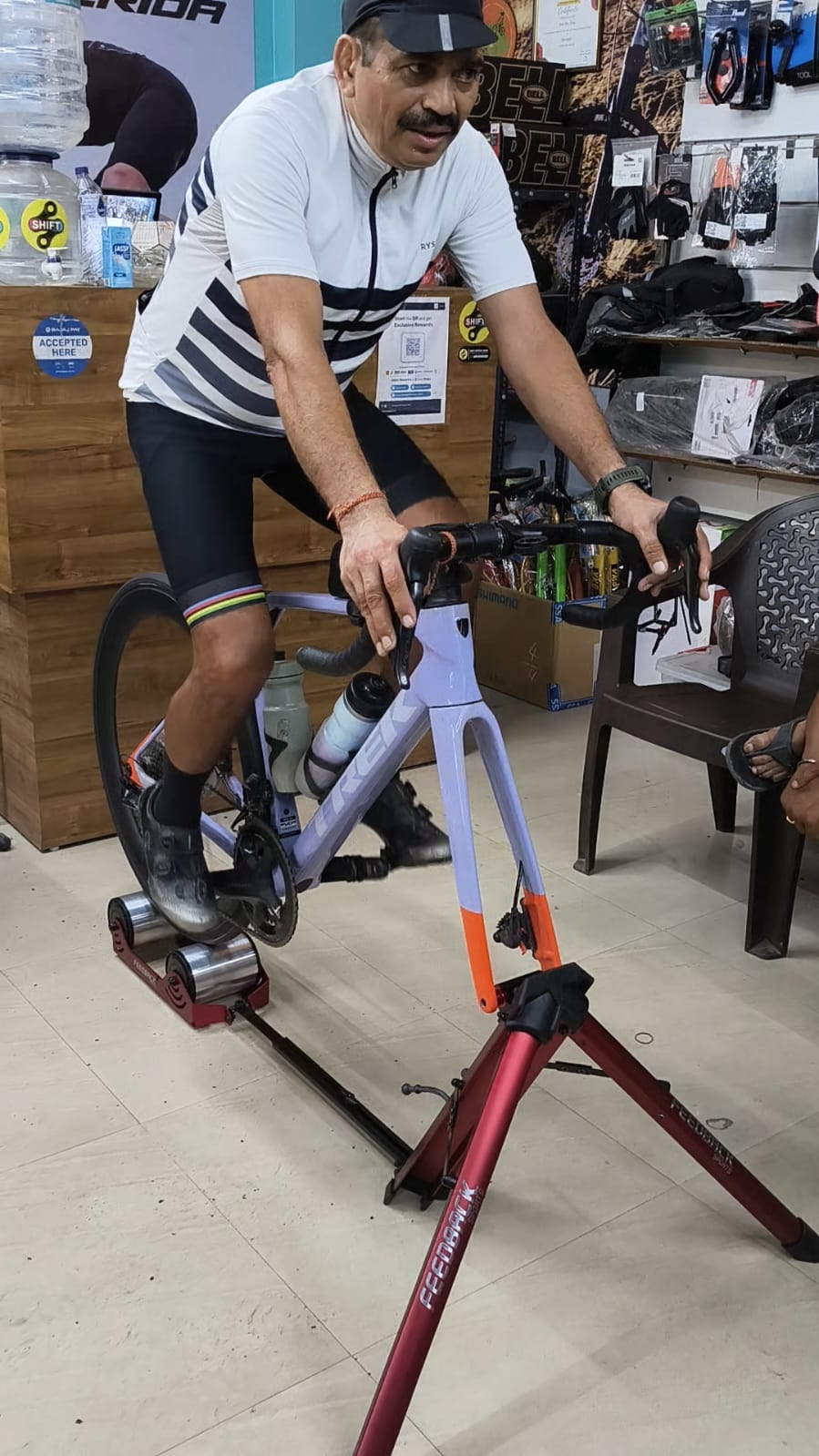 Client completing an in-store bike fitting session